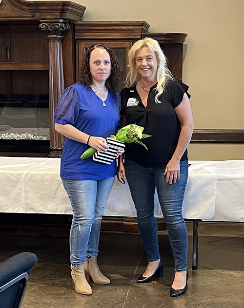 Christina Swank, RN, Emergency Department charge nurse, was named Bothwell Regional Health Center’s 2023 Employee of the Year at its annual employee recognition luncheon. Bothwell Board of Trustees Chair Deidre Esquivel is shown with Swank.